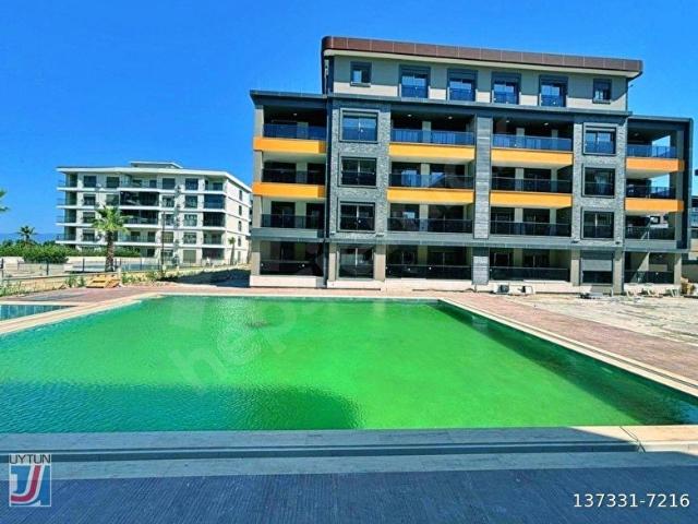UYTUNDAN ÖRENDE HAVUZLU ULTRALÜKS SİTEDE 2+1 AKILLI DAİRE