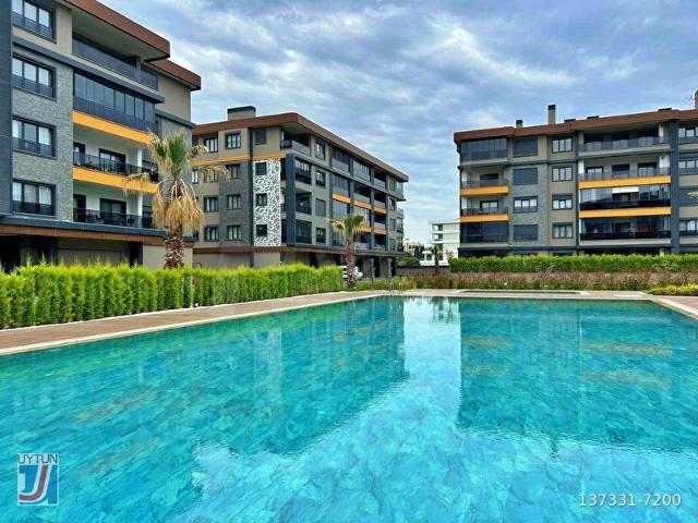 UYTUNDAN ÖREN'DE HAVUZLU VE TENİS KORTLU SİTEDE 1+1 AKILLI DAİRE