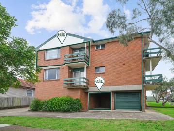 VACANT Elevated two bedroom unit with district views