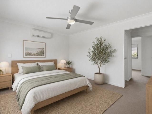 Vacant & Move In Ready | Oversized Townhouse with Private Yard, Double Garage & Walk to Train