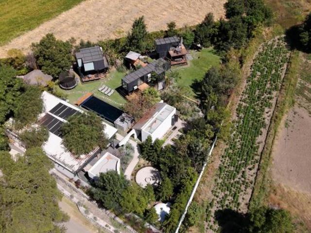 VENTA AMPLIO TERRENO CON BUNGALOWS CON ARQUITECTURA VANGUARDISTA ESPACIO PERFECTO PARA AIRBNB  MOBIL