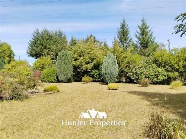 Venta Parcela con casa y 2 deptos, Villarrica | 4 dormitorios por 8500.00 en Villarrica