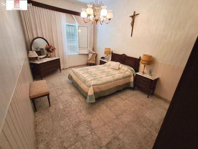 VENTA PUEBLA DE LA CALZADA ZONA CENTRO VIVIENDA DE PLANTA BAJA DE ESQUINA CON GARAJE