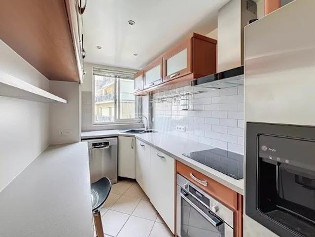 Vente Appartement 3 pièces 70.03 m2 Paris 16ème