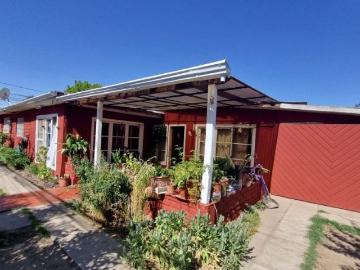 Vende amplia casa de esquina con Local Comercial Gultro Olivar