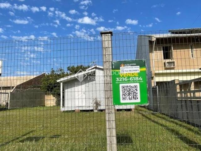 Vende se terreno urbano com benfeitorias, no centro de Imbé