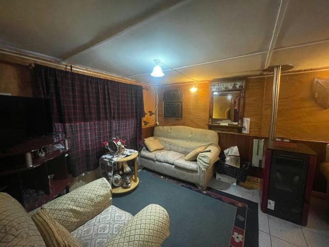 Vendo casa 160 m2 con local comercial | 5 dormitorios por 180000. 00 en Puerto Montt