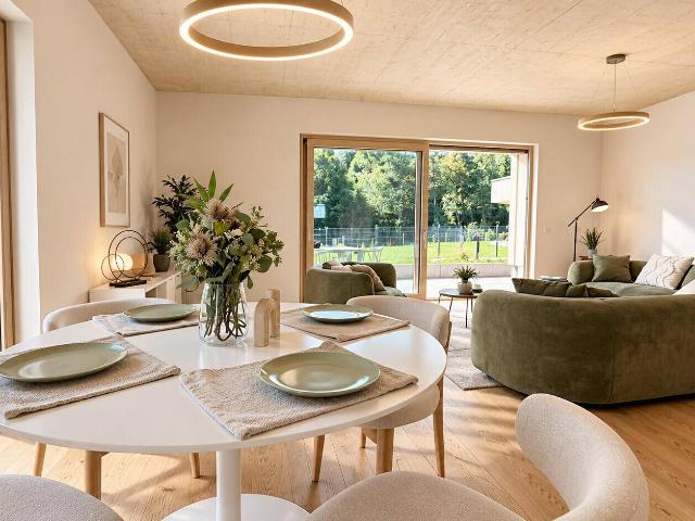 Velden am Wörthersee. *ERSTBEZUG* Eckgartenwohnung mit Grünblick und 2 Tiefgaragenplätzen, in perfekter Zentrumslage