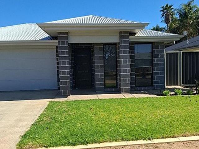 Very neat and tidy, near new 4 bedroom home