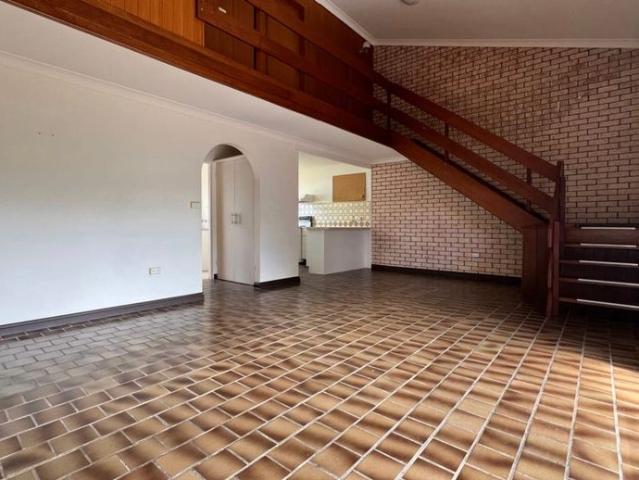 VERY CONVENIENT UNIT WITH OWN YARD