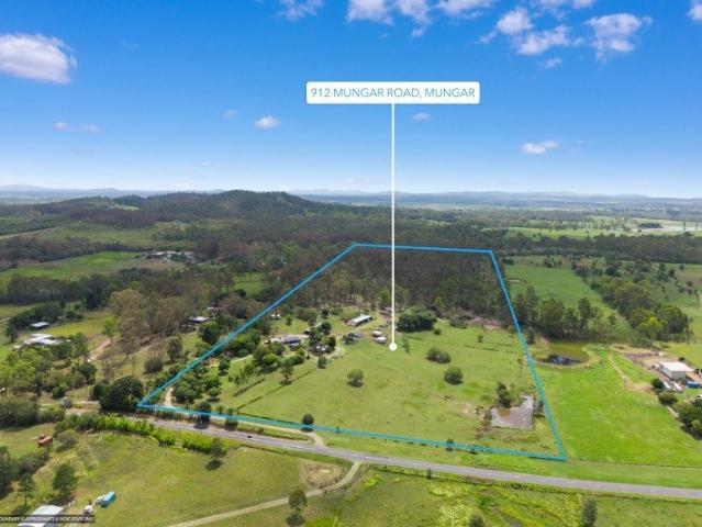 Very usable 40 acres, brick home plus sheds