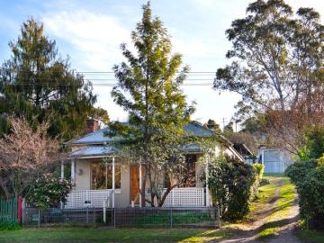 Verandah fronted 1800s Cottage with treed outlook and a walk to train, pubs and town centre lifestyle