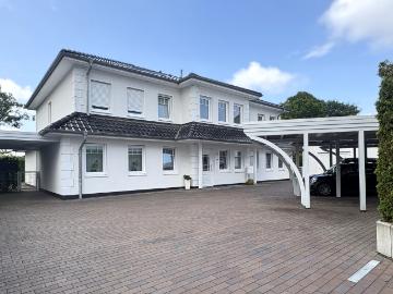Vermietete Dachgeschosswohnung mit Carport in attraktiver Lage von Bad Zwischenahn