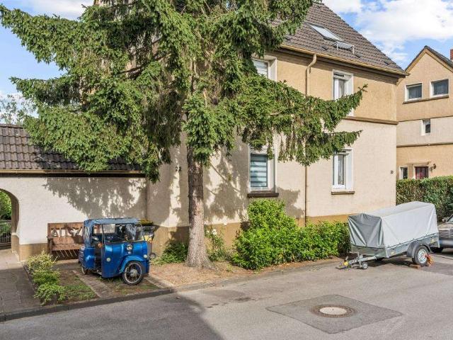 vermietete Doppelhaushälfte mit großem Garten