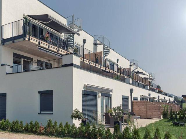 Vermietete Wohnung mit Terrasse und Carport