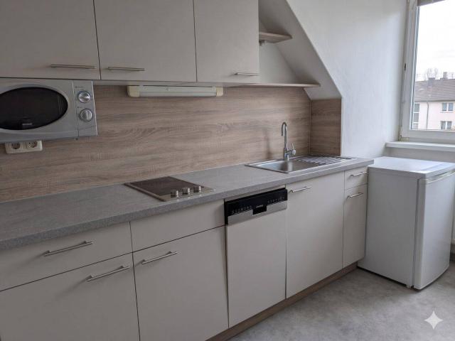 Vermietete, zentrale Dachgeschoßwohnung