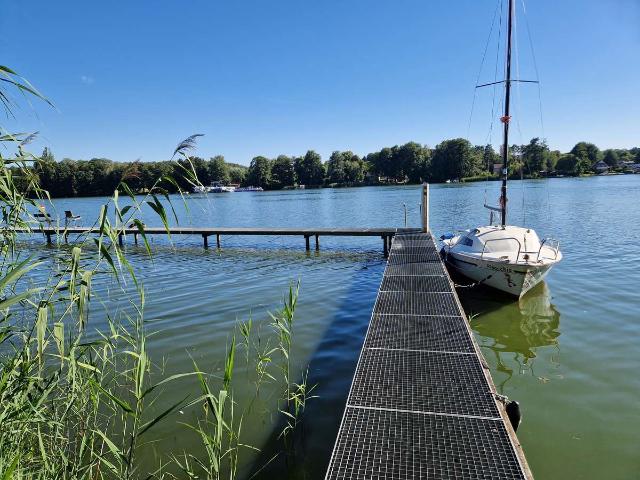 Vermietete 2 Zimmer Wohnung mit Terrasse, Stellplatz und Wasserzugang
