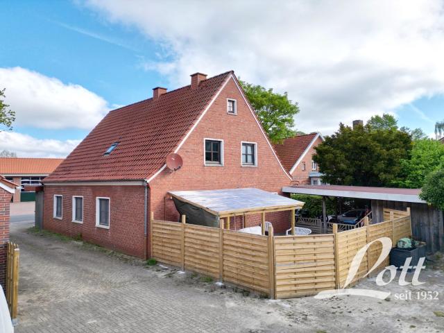 Vermietetes Zweifamilienhaus in zentraler Ortslage von Hollen Bruttorendite ca. 5,28 %