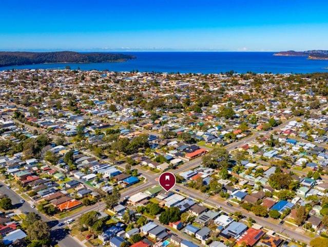 Versatile Coastal Opportunity with Cottage, Cabin & Rear Lane Access
