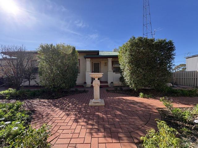 Versatile Commercial & Residential Opportunity on One Title
