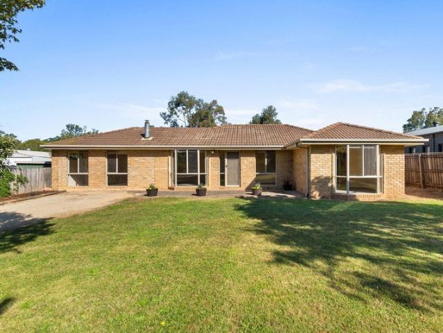 Versatile brick home with potential