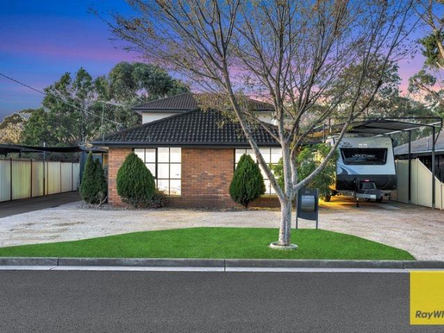 Versatile Double Storey Home with Side Access & Family Appeal