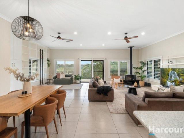 Versatile dual level living on 1/4 acre block, north facing backyard & views