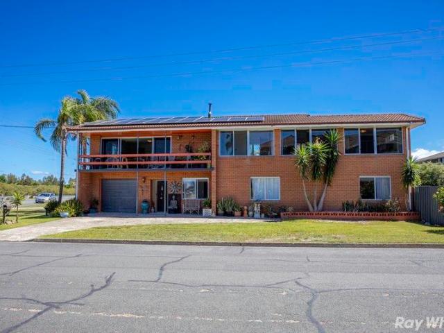 Versatile Dual Living with Water Views Prime Tuncurry Location