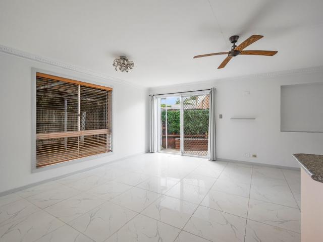 VERSATILE FOUR BEDROOM HOME IN A QUIET CUL DE SAC