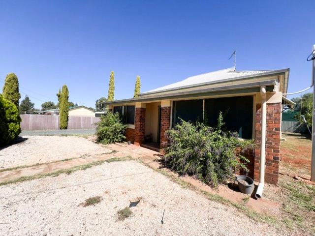 Versatile Family Living with Exceptional Shed