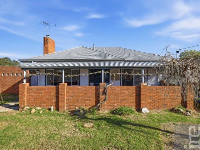 Versatile home with potential