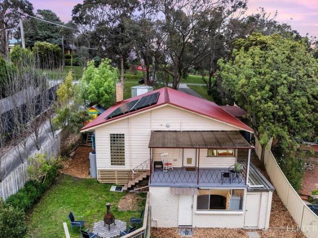 Versatile Home with Rental Suite and Views