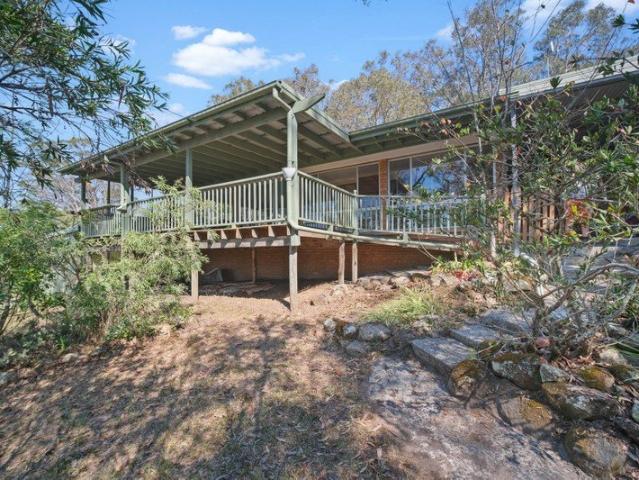 Versatile homestead atop 16 acres