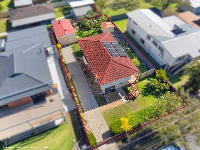 VERSATILE HIGHSET HOME WITH WIDE SIDE ACCESS TO SHED FOR THE BOYS TOYS!