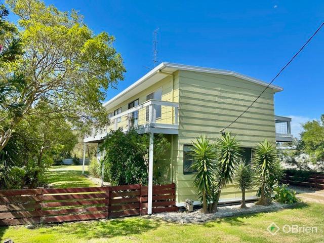 Versatile Living Just Moments from the Water