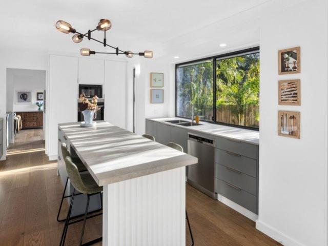Versatile Single Level Retreat With Dual Living Potential In Quiet Cul De Sac