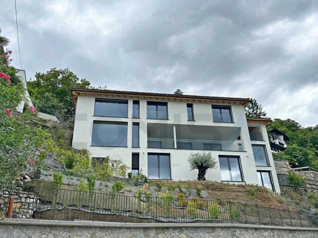 VICO MORCOTE Neue moderne Villa 7,5 Zimmer Seeblick
