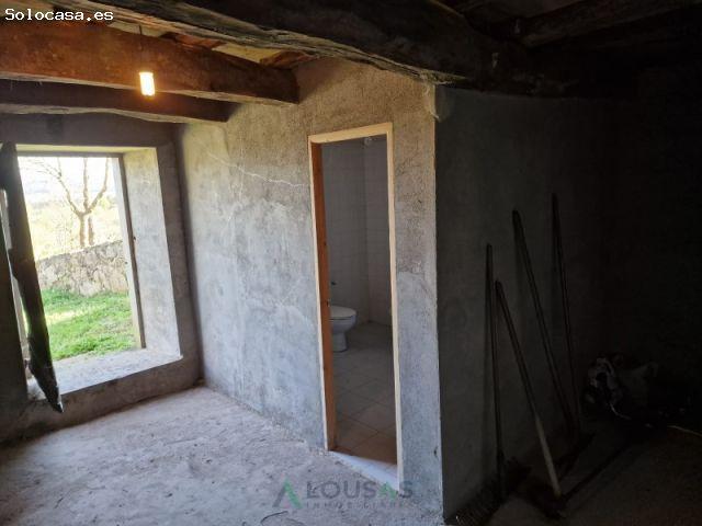 Vida rural con encanto: casa de piedra con finca y pajar en Antas de Ulla