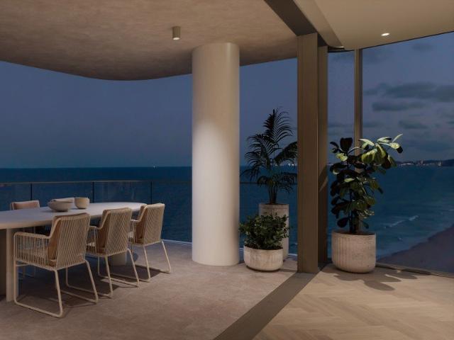 VIEWS FOREVER FROM THIS STUNNING BEACHFRONT APARTMENT