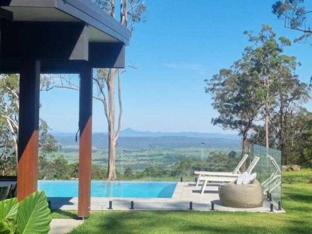 VIEWS VIEWS VIEWS! Resort Style Acreage, Heated pool, Private Gated