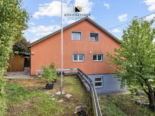 Viel Platz für die Familie – Doppelhaushälfte mit Garten, Kamin & Einliegerwohnung