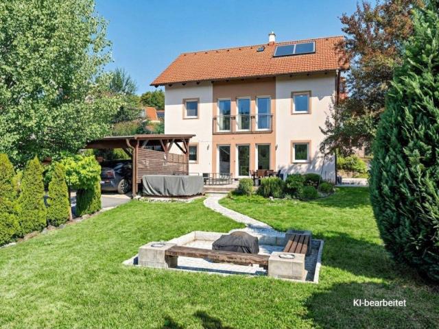 Viel Platz zum Leben – gepflegtes Familienhaus mit großem Garten und Grünblick