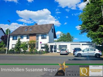 Vielfältige Nutzungsmöglichkeiten. Beziehbares 2 Familienhaus mit vermieteten Betriebsgebäude in Solingen Aufderhöhe