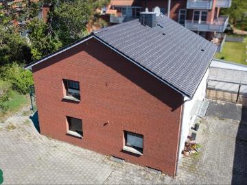 Vielseitiges Immobilienpaket Zweifamilienhaus plus bebaubares Grundstück in Toplage
