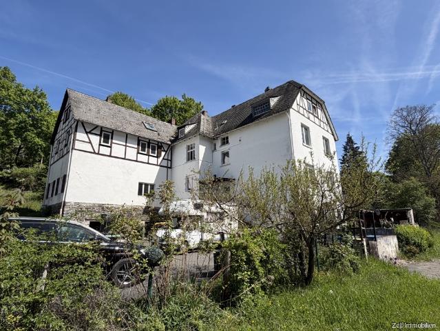 Vier Eigentumswohnungen mit Garten und Pkw Stellplätzen