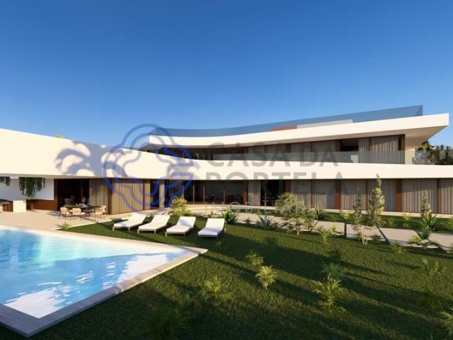 Villa T7 Exclusiva com Rooftop e Piscina Suspensa nos Salgados
