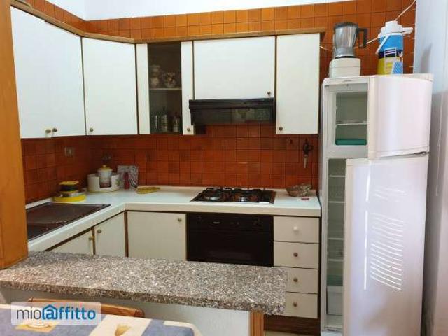 Villa a schiera arredata con piscina