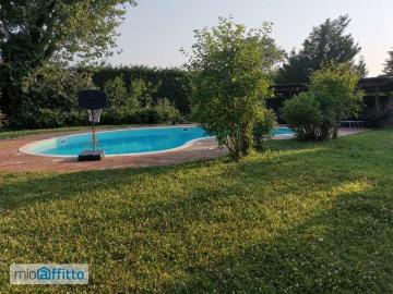 Villa a schiera arredata con piscina