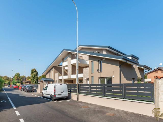 Villa a schiera via Ortigara, Origgio
