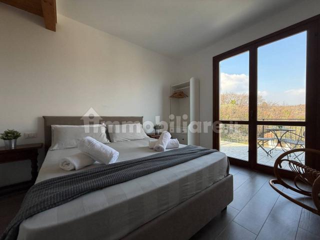 Villa a schiera via della Molaria, Pieve Vecchia, Villaggio Sanghen, Manerba del Garda